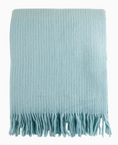 Load image into Gallery viewer, A light blue ribbed knit throw blanket with fringed edges, shown flat against a plain white background.