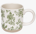 Load image into Gallery viewer, A white ceramic mug with a green floral toile pattern and a light beige speckled base, shown against a plain white background.

