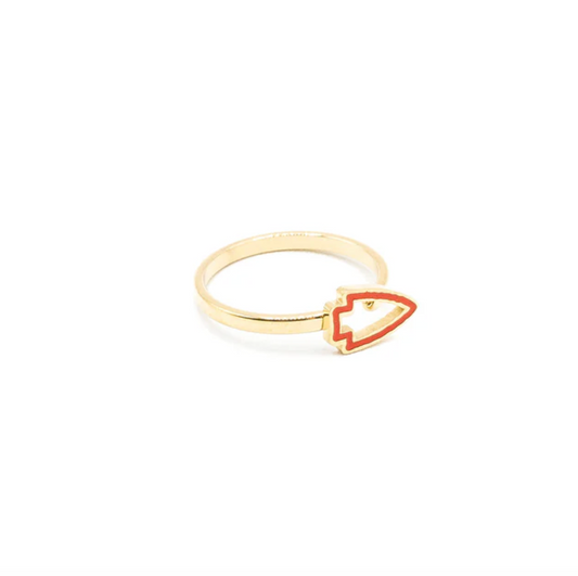 a gold ring with a red Arrowhead logo on it, referencing the Kansas City Chiefs. 