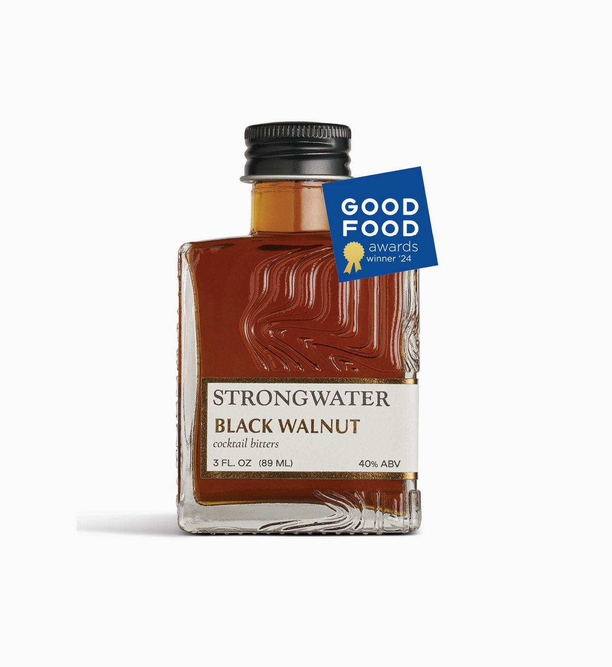A decorative glass bottle containing Black Walnut cocktail garnishes. 