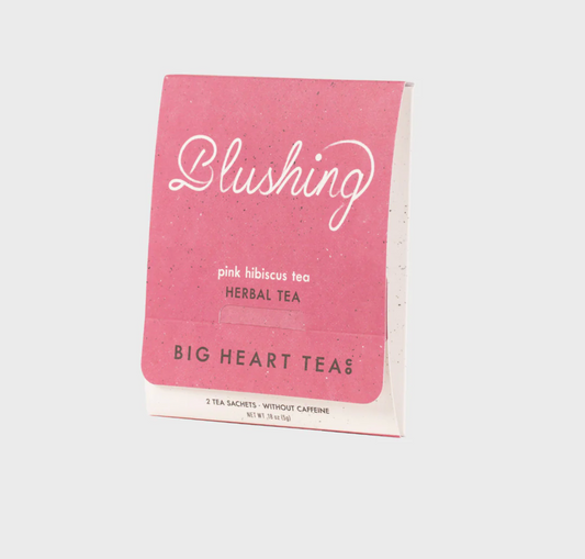 A 2pack of Blushing Pink Hibiscus Tea with pink packaging