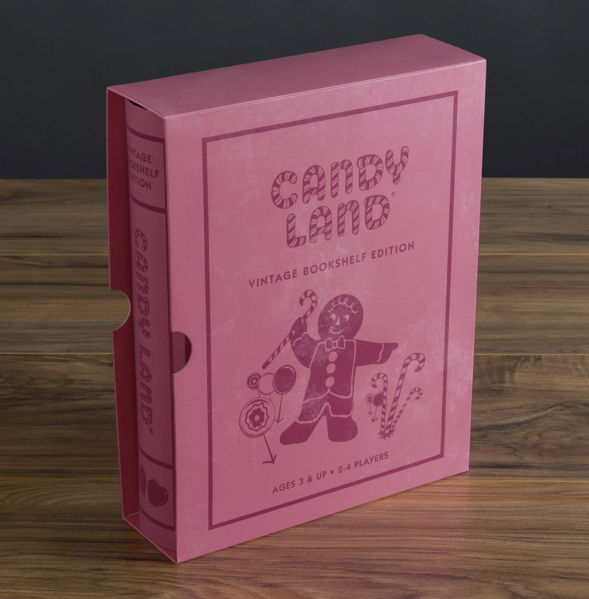 The full packaging of the Candy Land board game box in the style of a vintage book. 