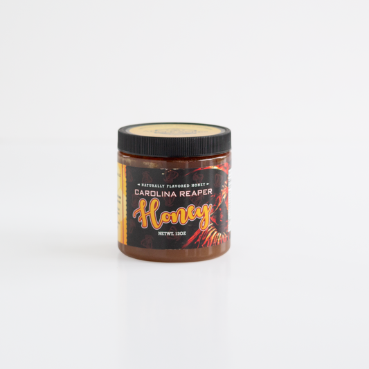 A jar of honey made with Carolina Reaper peppers. 