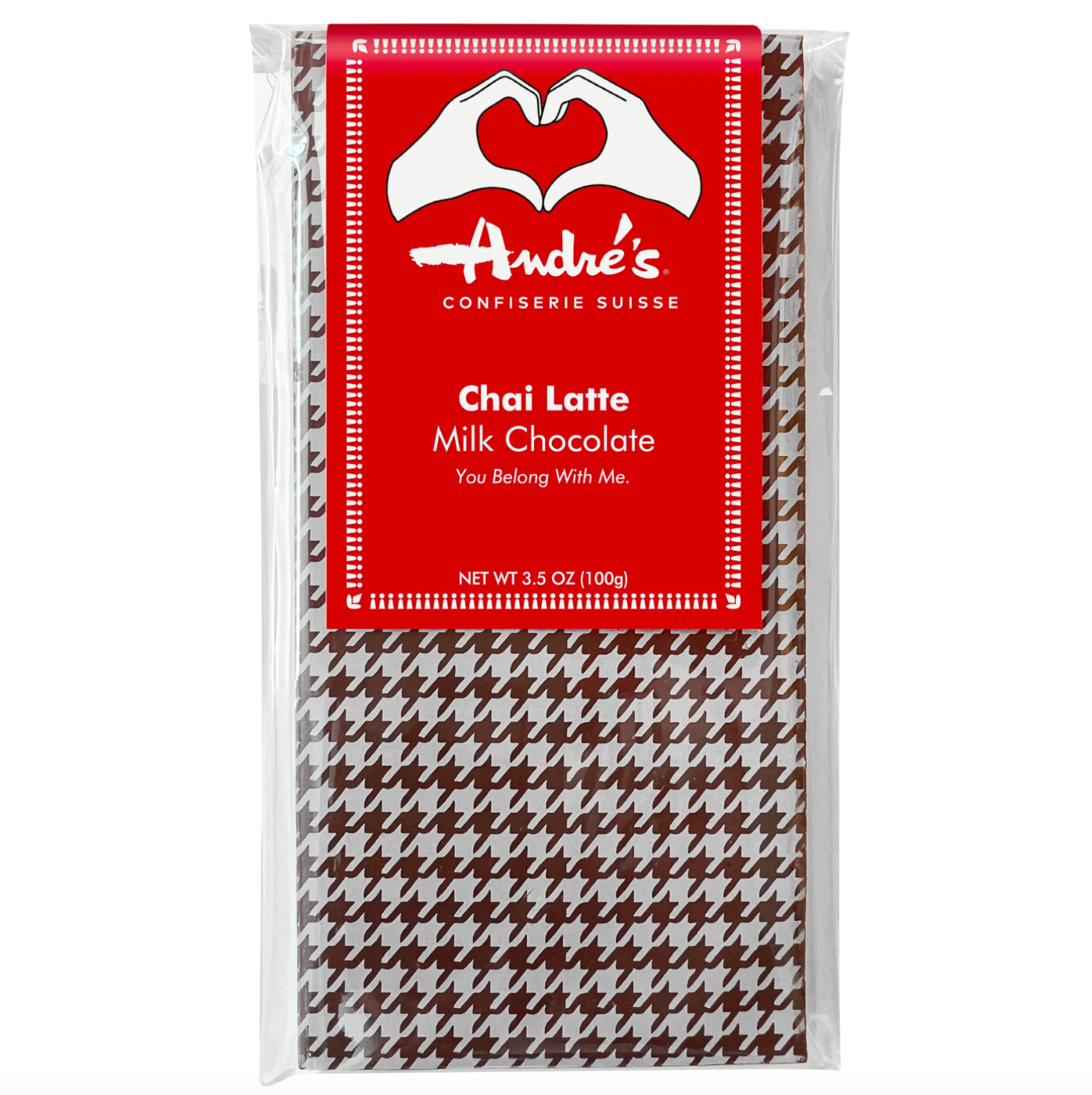 A 3.5 oz package of Andre's Chai Latte Milk Chocolate, featuring a brown and white houndstooth pattern with a red label on a white background.