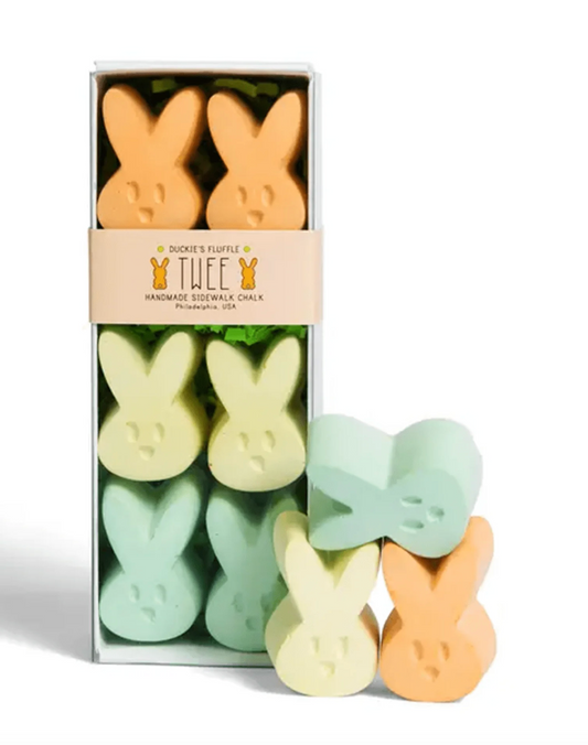 A boxed set of bunny-shaped handmade sidewalk chalk with several loose bunny chalk pieces displayed in front on a white background. The package label reads 'Duckie's Fluffle Twee Handmade Sidewalk Chalk'.
