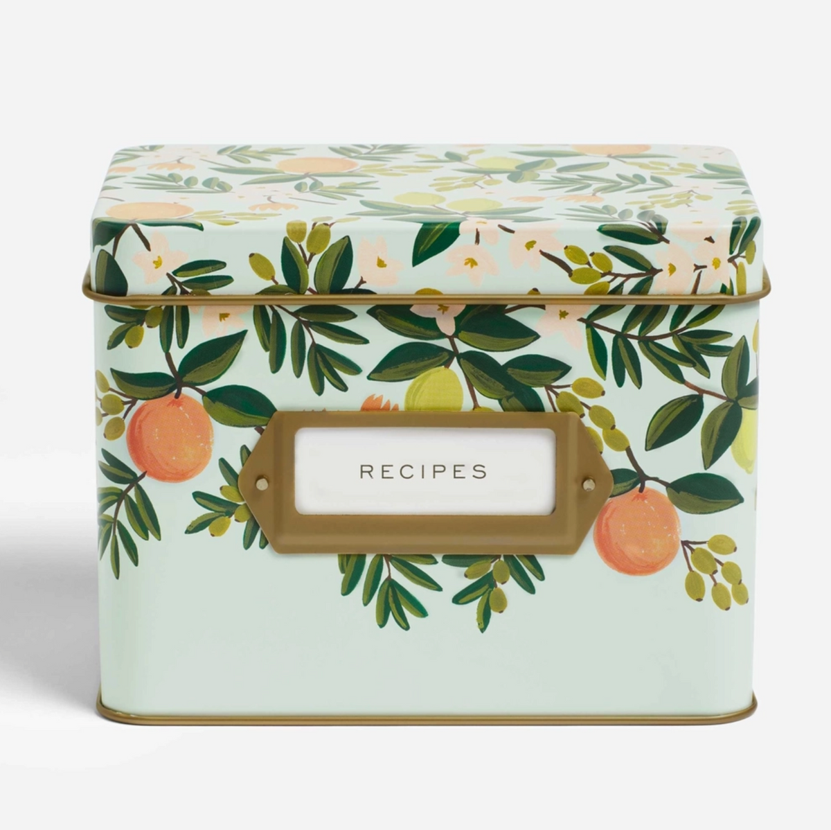 A square metal recipe box with a mint green background and an orange and green botanical pattern on the lid and front. It features a gold-toned label frame with a white center labeled 'RECIPES'.