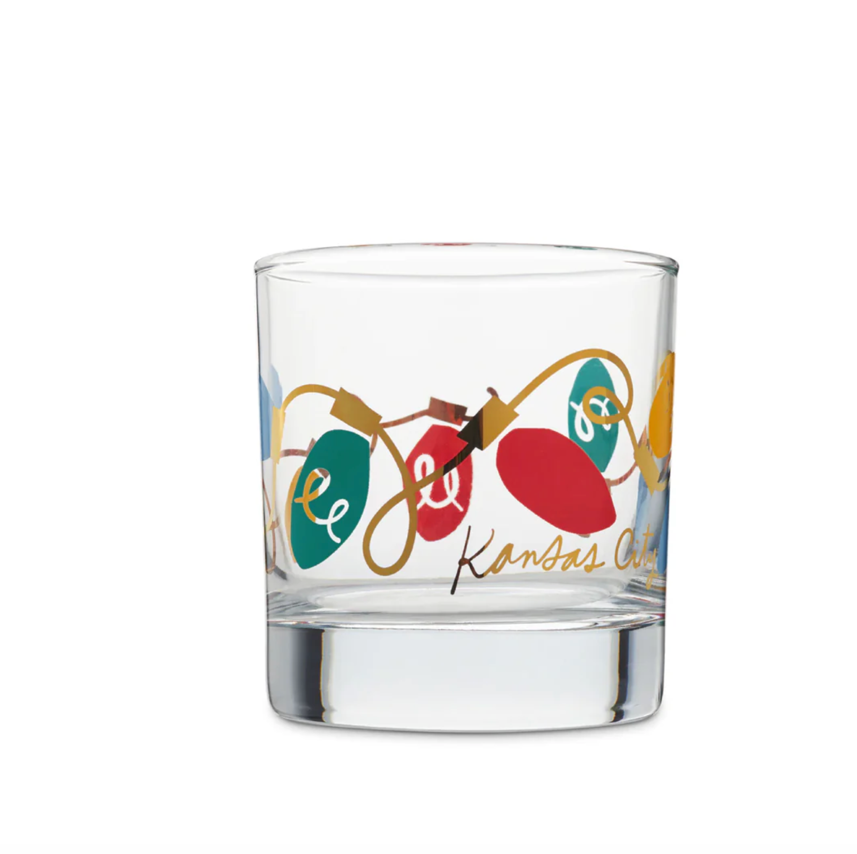 A clear glass rocks tumbler featuring a festive Christmas string lights design with red, green, and gold holiday bulbs and the text 'Kansas City' in gold script.
