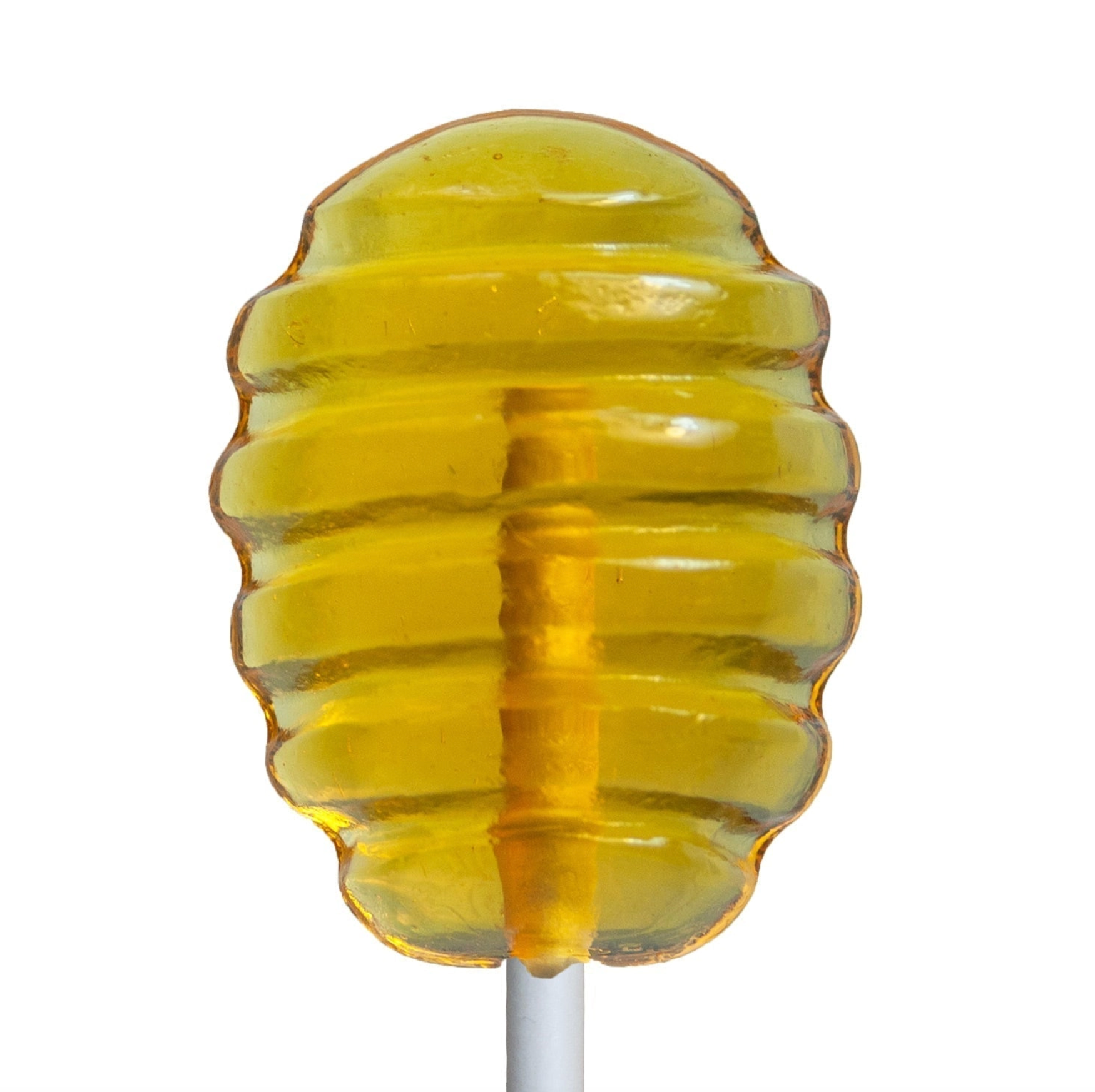 A translucent honeycomb-shaped honey stirrer lollipop with a white stick, isolated on a white background.