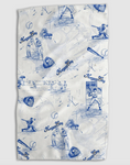 Load image into Gallery viewer, A white and blue patterned kitchen towel that features different scenes from Kansas City Royals baseball, including baseball players hitting the ball and winding up to hit the ball, and illustrations of baseballs, baseball mitts, and the words "Kansas City"
