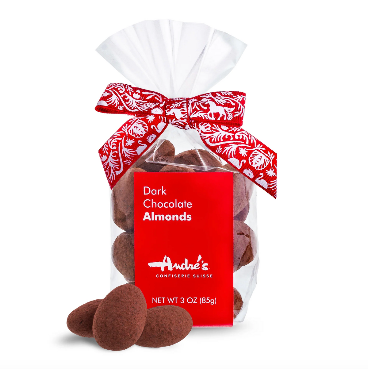 A 3 oz bag of Andre's Dark Chocolate Almonds, featuring a clear plastic bag filled with chocolate-covered almonds, tied with a red and white patterned ribbon, and labeled with a red front tag.