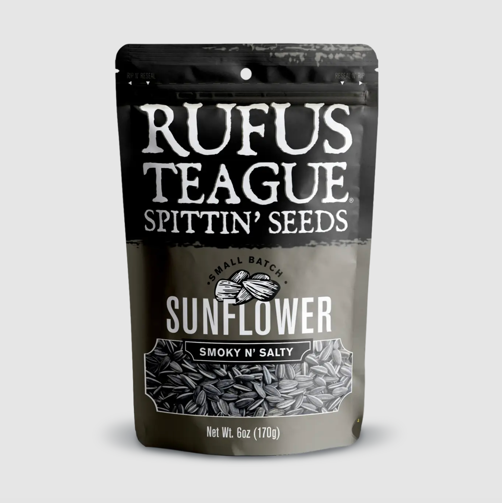 A stand-up pouch of Rufus Teague Spittin' Seeds Smokey 'N Salty Sunflower seeds, shown on a light gray background.