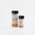 Load image into Gallery viewer, A 3.2 oz bottle and a 7 oz bottle of Jack Stack Barbecue Kansas City All Purpose Seasoning on a clean white background.
