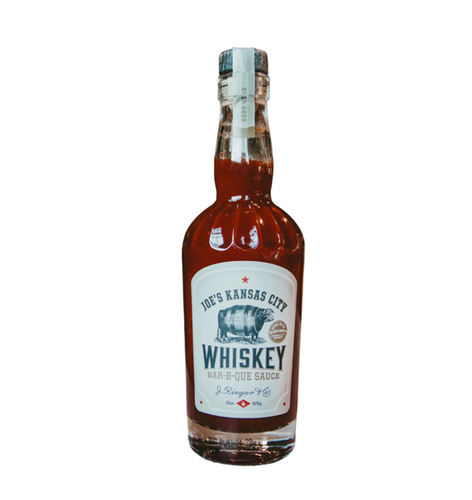 A bottle of Joe's Kansas City Rieger Whiskey BBQ Sauce on a plain white background.