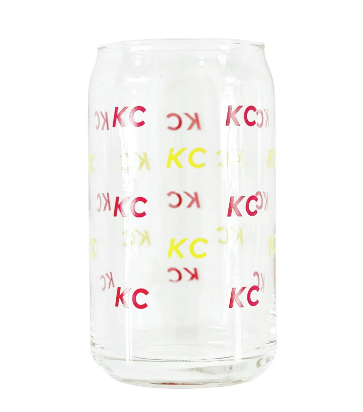 A clear glass can-shaped tumbler with repeating red and yellow 'KC' lettering, shown on a plain white background.