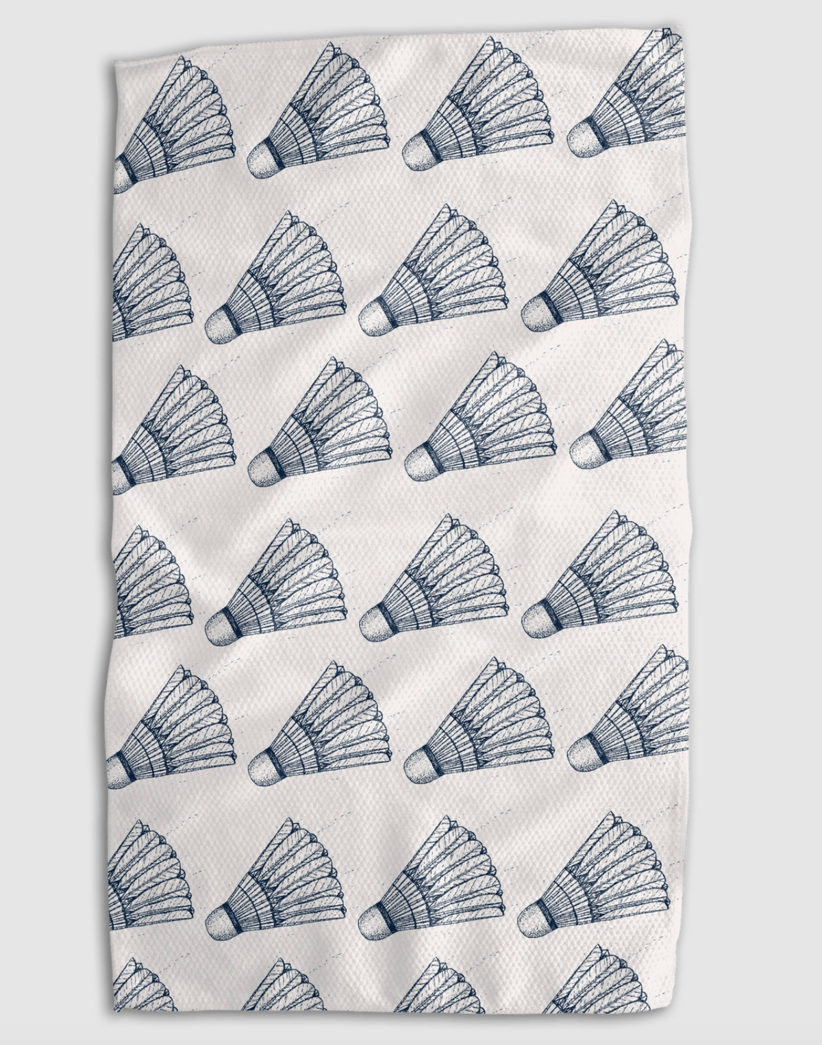A rectangular white towel or cloth featuring a repeating pattern of blue hand-drawn shuttlecocks, shown flat against a light gray background.