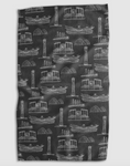 Load image into Gallery viewer, A rectangular black towel or cloth featuring an all-over white line-art pattern of different Kansas City landmarks, shown flat against a light gray background.
