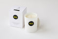 Load image into Gallery viewer, A white ceramic candle jar with a black circular 'MIZ' logo sits next to its white packaging box on a clean white background.
