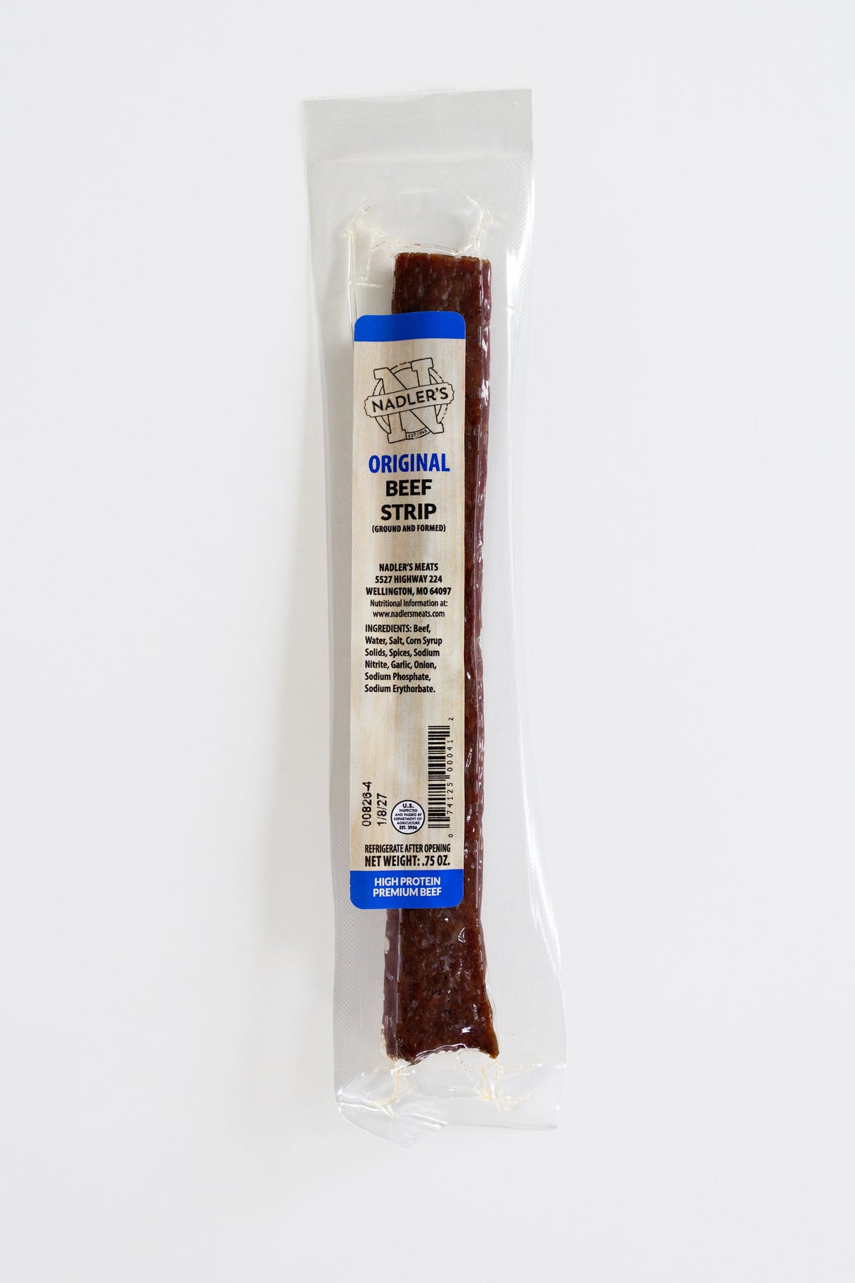 A single packaged beef strip snack on a plain white background. The product is sealed in a clear plastic bag with a white paper label that reads 'Nadler's Original Beef Strip' with blue accent bands.