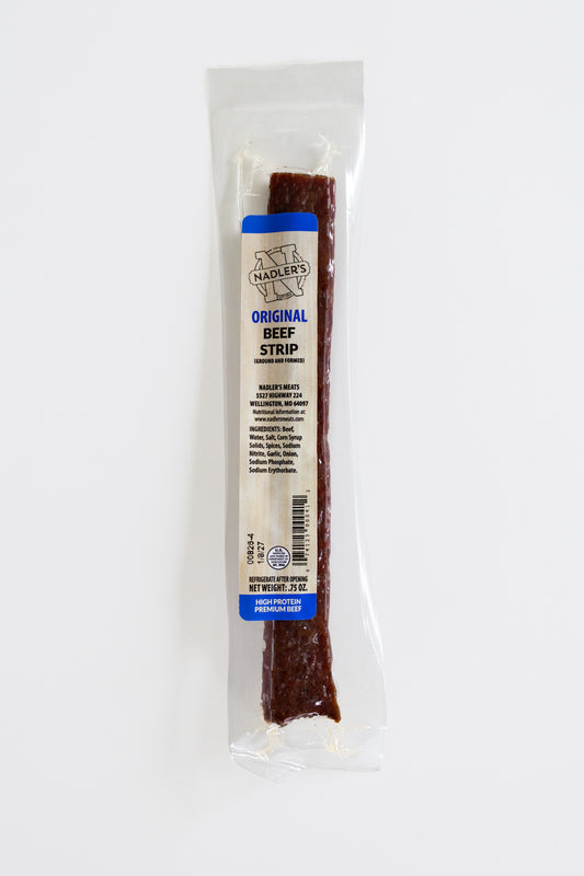 A single packaged beef strip snack on a plain white background. The product is sealed in a clear plastic bag with a white paper label that reads 'Nadler's Original Beef Strip' with blue accent bands.
