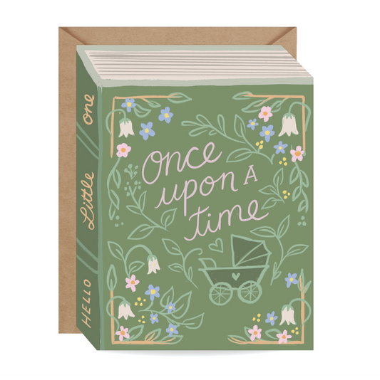 A square greeting card with a kraft envelope behind it. The card has a sage green background decorated with delicate floral illustrations and the words 'Once upon a time' in white script, with 'Hello Little one' printed vertically on the spine.