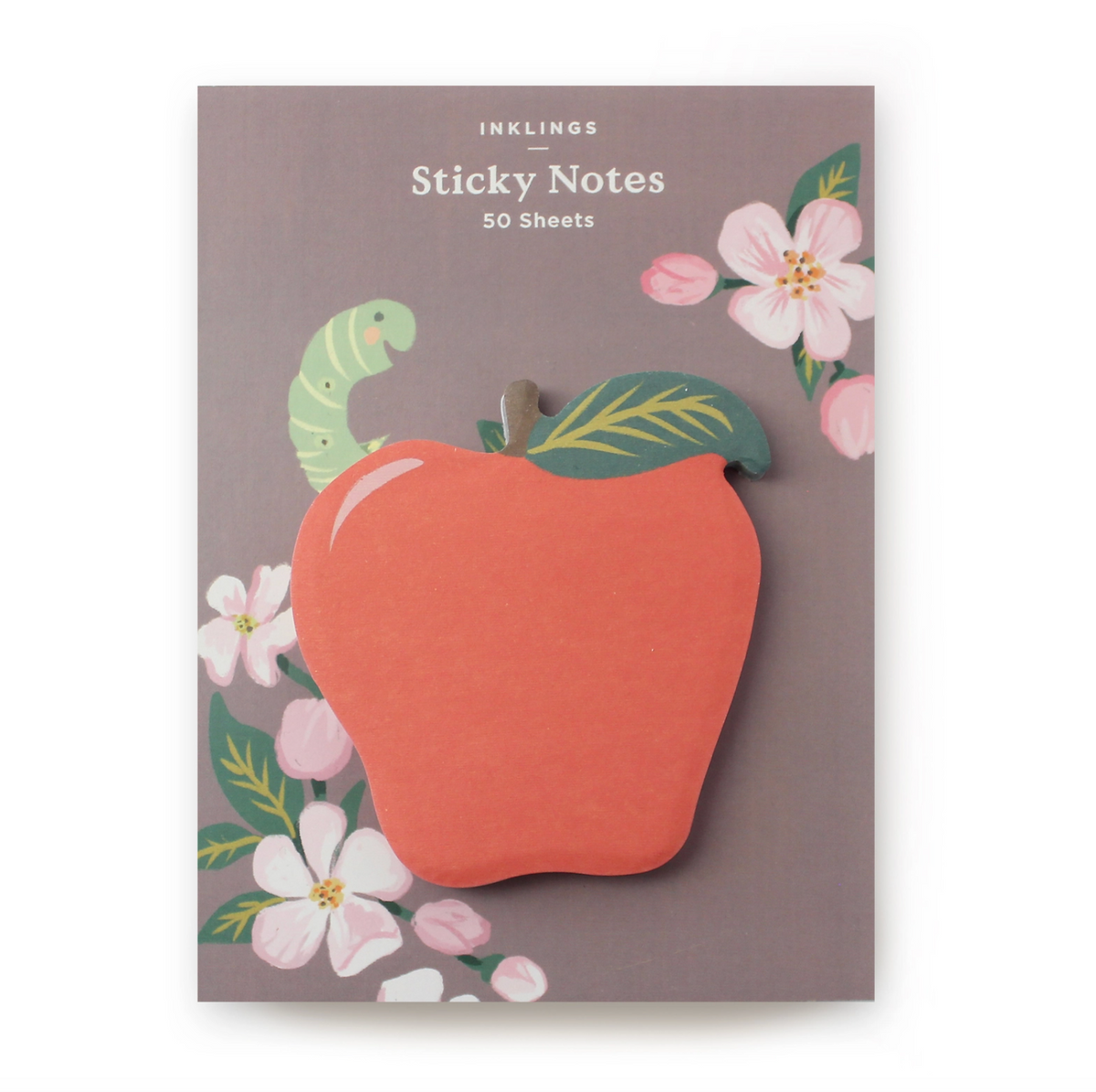 Apple-shaped sticky notes on a brown backing card that features florals and a green worm sticking out of the worm.